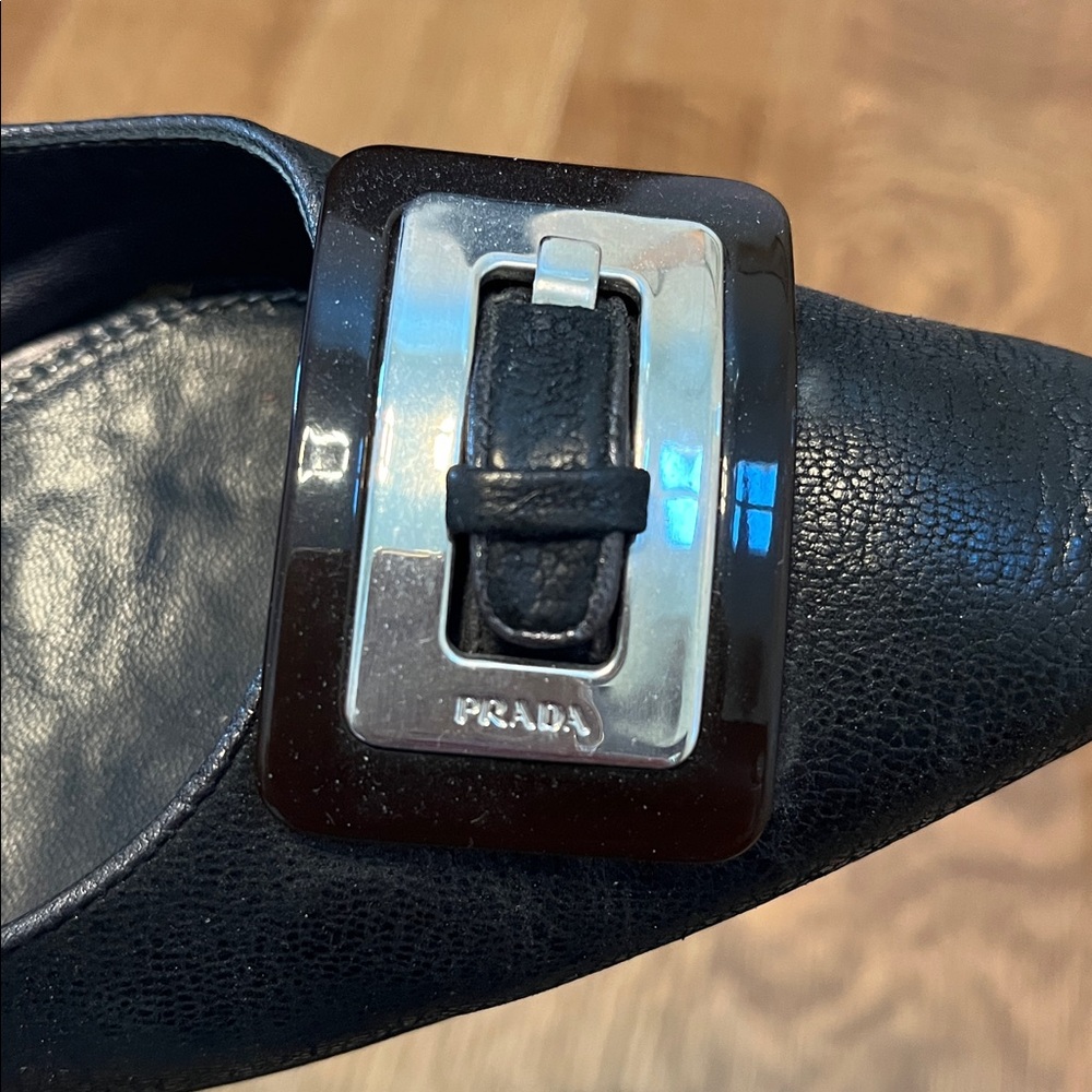 Prada Black Leather Point Toe Flats with Silver Buckle